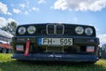 Round headlight on a old BMW car. Front view Royalty Free Stock Photo