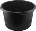 Round heavy duty black plastic basin for construction works. Isolated on white