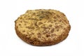 Round home baked rye bread isolated over white.