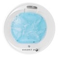 Round jacuzzi with swirling blue water