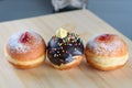 Round jelly or jam doughnut sufganiyot and chocolate sufganiyah for Chanukah Jewish holiday.