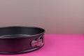 Round kitchen baking dish on background for cakes Royalty Free Stock Photo