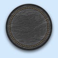 Round leather stitched label. Realistic black tag.