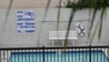 Round lifebuoy, safety on water, swimming pool by motel, California, USA. Buoy.