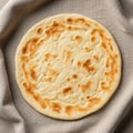 A round, lightly browned flatbread with Royalty Free Stock Photo