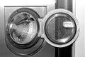 Round loading hatch of the industrial washing machine Royalty Free Stock Photo