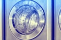 Round loading hatch of industrial washing machine Royalty Free Stock Photo