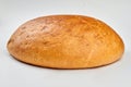 Round loaf of bread on white background. Royalty Free Stock Photo