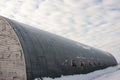 Round Long House in Snow