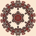 Round mandala in red and loght brown color.