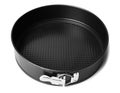 Round metal baking dish, isolated. Baking form with removable bumpers Royalty Free Stock Photo