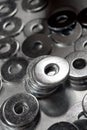Round metal steel washers on a table Royalty Free Stock Photo