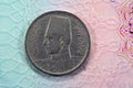 round metal ten Egyptian milliemes series 1941 AD 1360 AH features bust of King Farouk I of Egypt on obverse side and value and