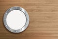 Round metal window. Porthole on a wooden wall Royalty Free Stock Photo