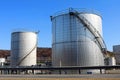 Two Metallic Round Chemical Storage Tanks