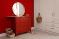 Round mirror and chest of drawers near wall in room. Modern interior design Royalty Free Stock Photo