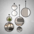 Round mirrors hanging on the wall reflecting interior design scene, minimalist white living, modern architecture concept idea