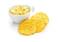 Round nacho chips and avocado dip. Yellow tortilla chips and guacamole in bowl Royalty Free Stock Photo