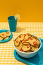 Round nachos corn tortilla chips with red chili slices Royalty Free Stock Photo