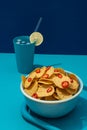 Round nachos corn tortilla chips with red chili slices Royalty Free Stock Photo