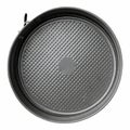 This round non-stick baking pan features a textured bottom designed for even baking and easy release. Ideal for making cakes or Royalty Free Stock Photo