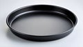 Round nonstick pizza pan baking tray kitchenware isolated Royalty Free Stock Photo