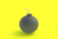 Round old bomb with fuze on yellow background