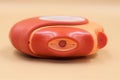 Round orange asthma inhaler background. Royalty Free Stock Photo