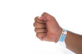 Round paper wristband for an event on the arm