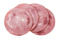 Round pieces of ham cut out on a white. Top view Royalty Free Stock Photo