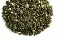 Round pile of dry tea. Chinese green tea with Jasmine flavor. Tea for weight loss and elimination of toxins