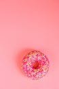 Round pink donut on pink background copy spase for text