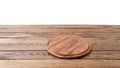 Round pizza food cutting board on brown wooden table isolated on white background. Wood tray plate and table top view. Empty copy Royalty Free Stock Photo