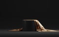 Round podium base with gold silk on luxury black abstract background Royalty Free Stock Photo