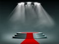 Round podium illuminated by searchlights Royalty Free Stock Photo