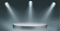 Round podium illuminated by searchlights. Royalty Free Stock Photo