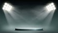 Round podium illuminated by searchlights. Royalty Free Stock Photo