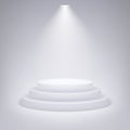 Round podium illuminated by spotlight on gray background. Eps10 vector illustration