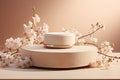 Round podium platform with spring blossom tree for product presentation on pastel background Royalty Free Stock Photo
