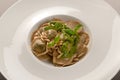 Round ravioli of wholemeal flour with pesto sauce