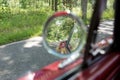 Round rear view mirror outside the retro car