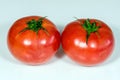 Ripe red raspberry tomatoes on white background Royalty Free Stock Photo