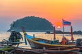 round red sun in sunset above fishing boats Royalty Free Stock Photo