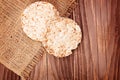 Round rice cakes on wooden table Royalty Free Stock Photo