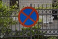 A round road sign indicating a place where vehicle parking is prohibited. tools for regulating traffic rules Royalty Free Stock Photo