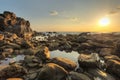 Round rocks and pebbles uncovered in low tide Royalty Free Stock Photo