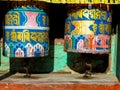 Prayer Nepali drum on a mountain path near the Buddhist temple