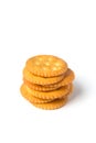 Round salted cracker cookies stacked isolated on white background