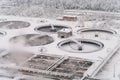 Round sedimentation tanks under snow in winter