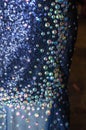 Round sequins on a dress blue evening. Details. Fragment